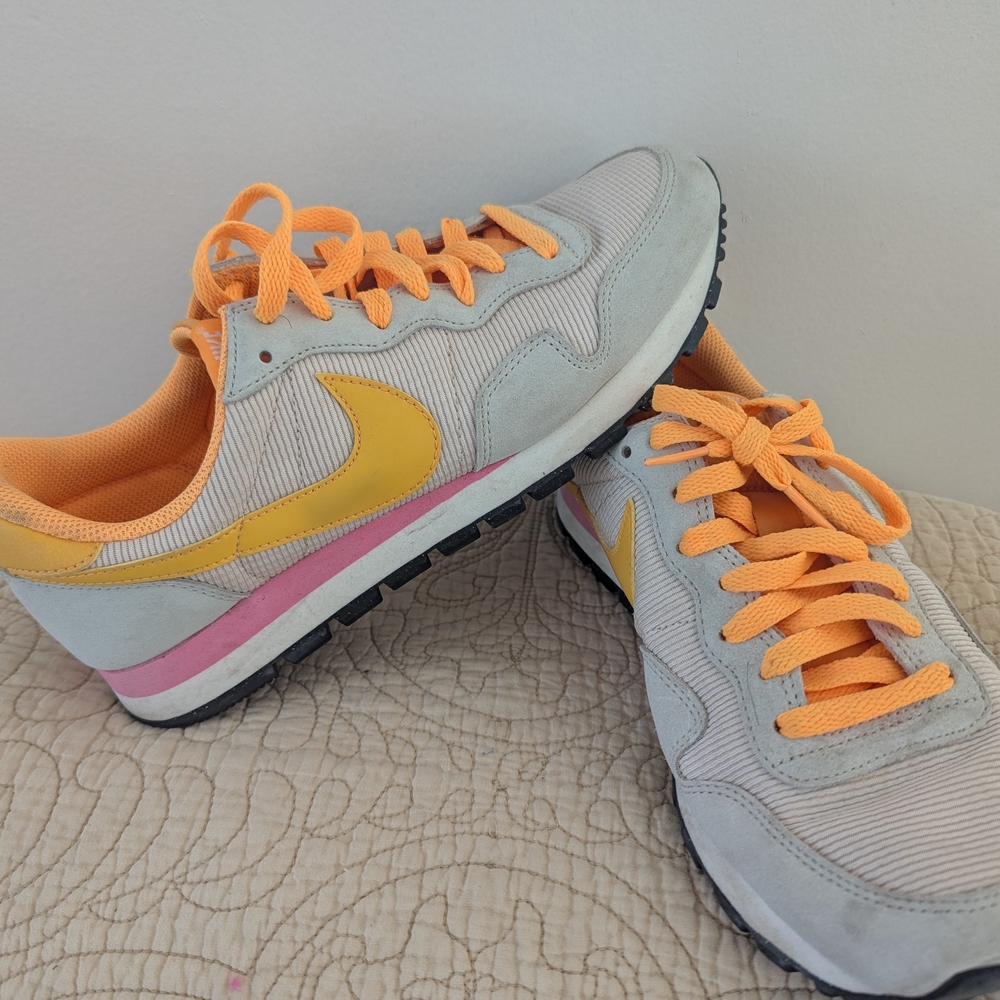 Nike Women's Sneakers with Yellow and Pink Highlights